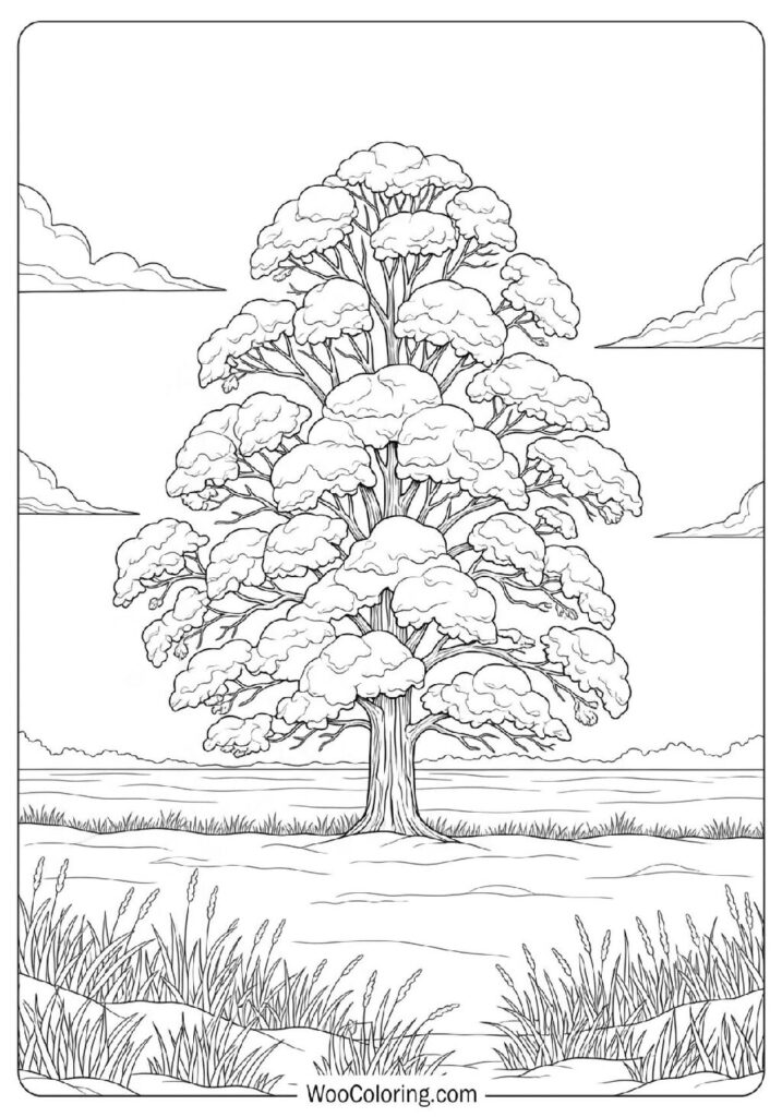 Tall Tree Covered in Snow Standing Alone in a Quiet Field